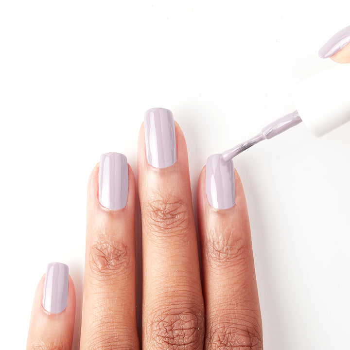 Applying Lilac Luster pastel purple nail polish