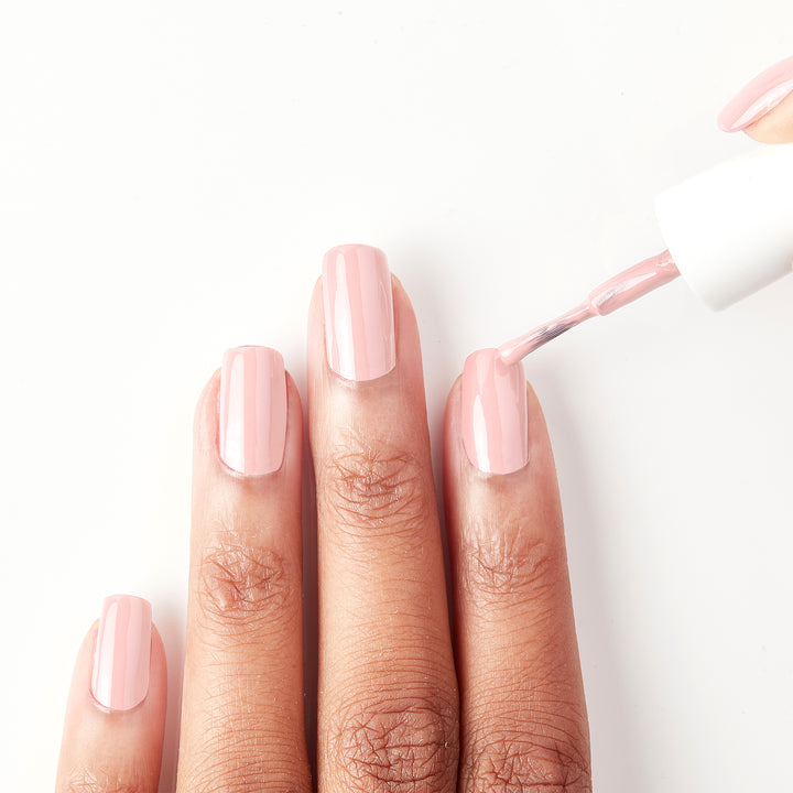 Applying Stuck On You sheer pink nail polish