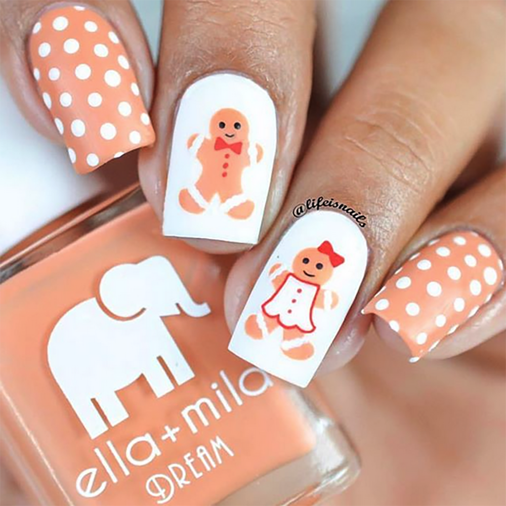 A La Nude burnt-orange nail polish with gingerbread and polka dot accent nail art