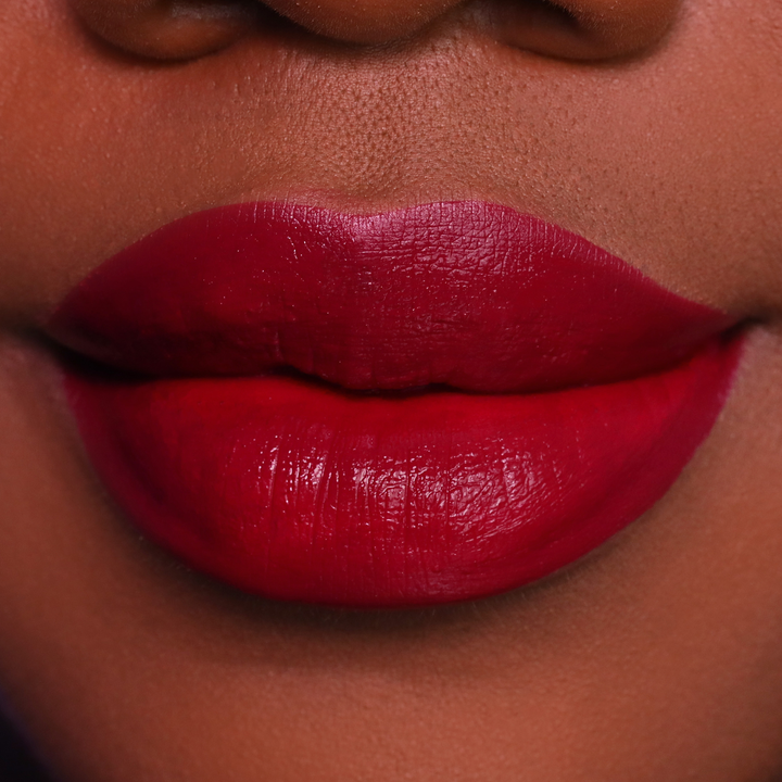 After 5 deep red lipstick on lips, medium-deep skin tone