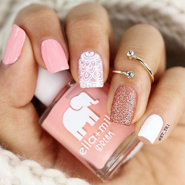 Bubble Trouble peachy pink nail polish with white lace and rose gold glitter accent nails