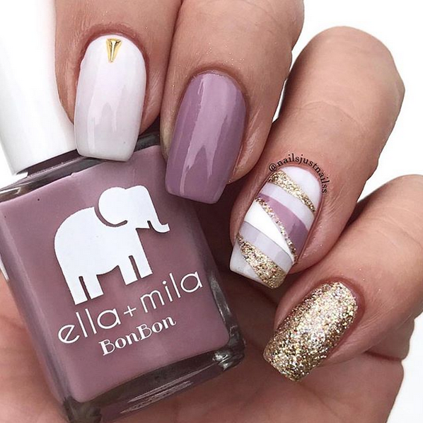 Dulce Amor mauve nail polish with white and gold glitter accent nails