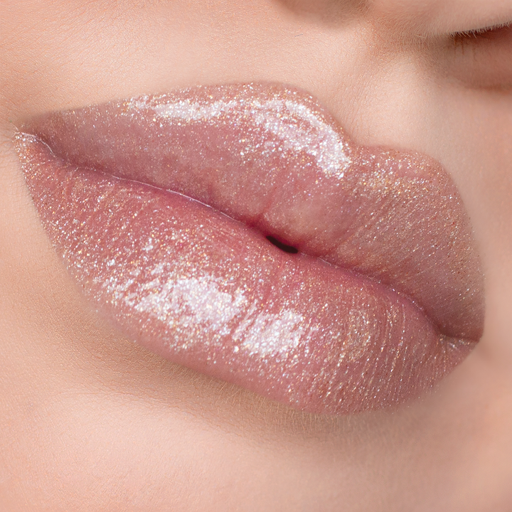 Get the Glow shimmer lip gloss on lips, light skin tone close-up