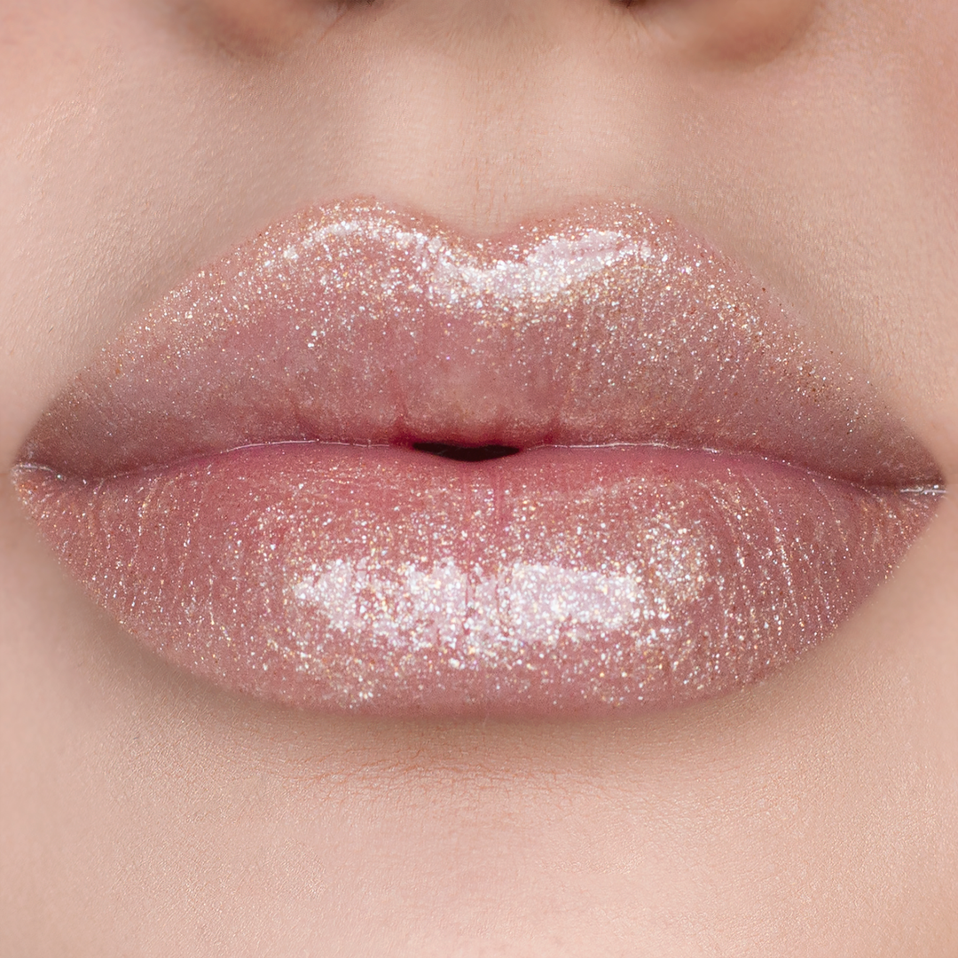Get the Glow shimmer lip gloss on lips, light skin tone