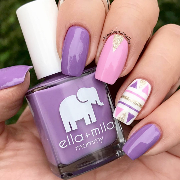 Lavender Fields purple nail polish with pink and gold striped accent nails