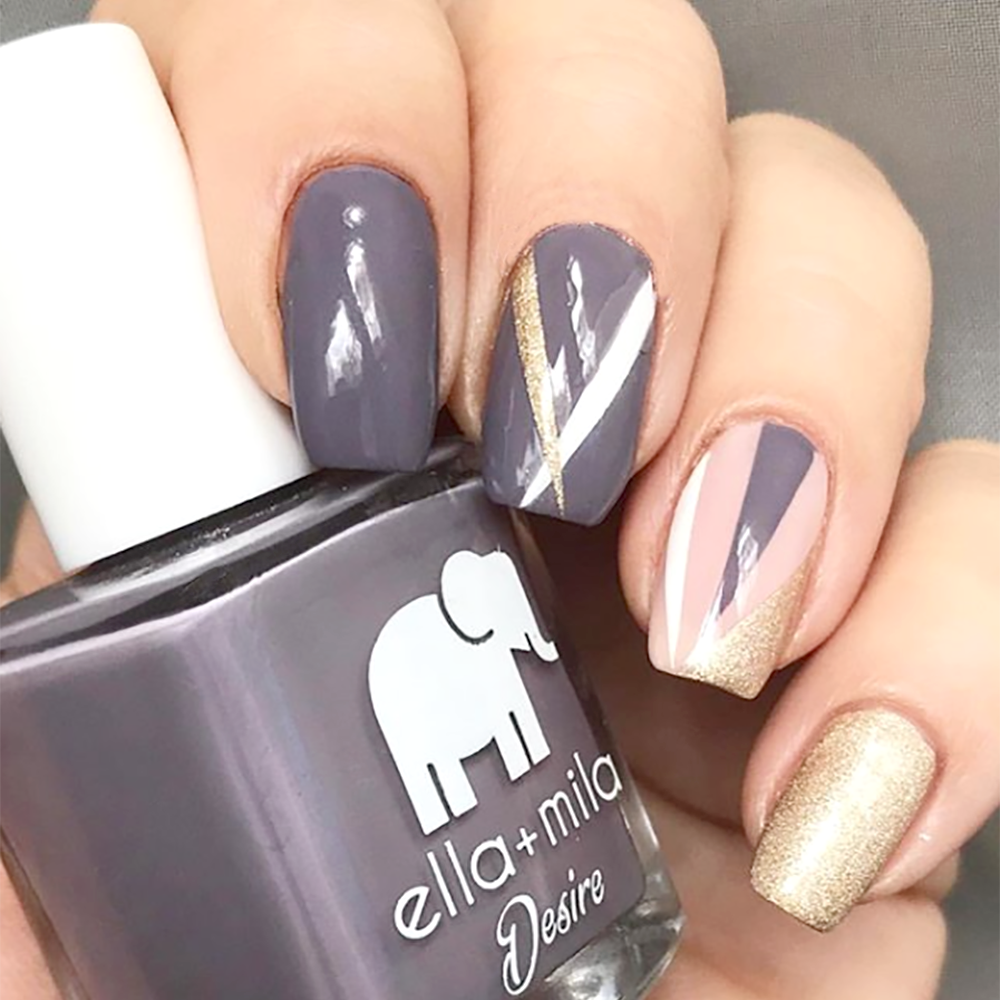 Mauve Over grey-purple nail polish with geometric and gold glitter nail art
