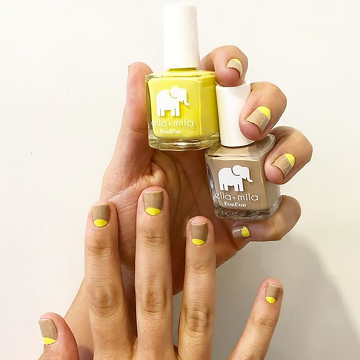 Mocha Dreams brown and Limoncello yellow nail polish manicures, two hands holding the bottles