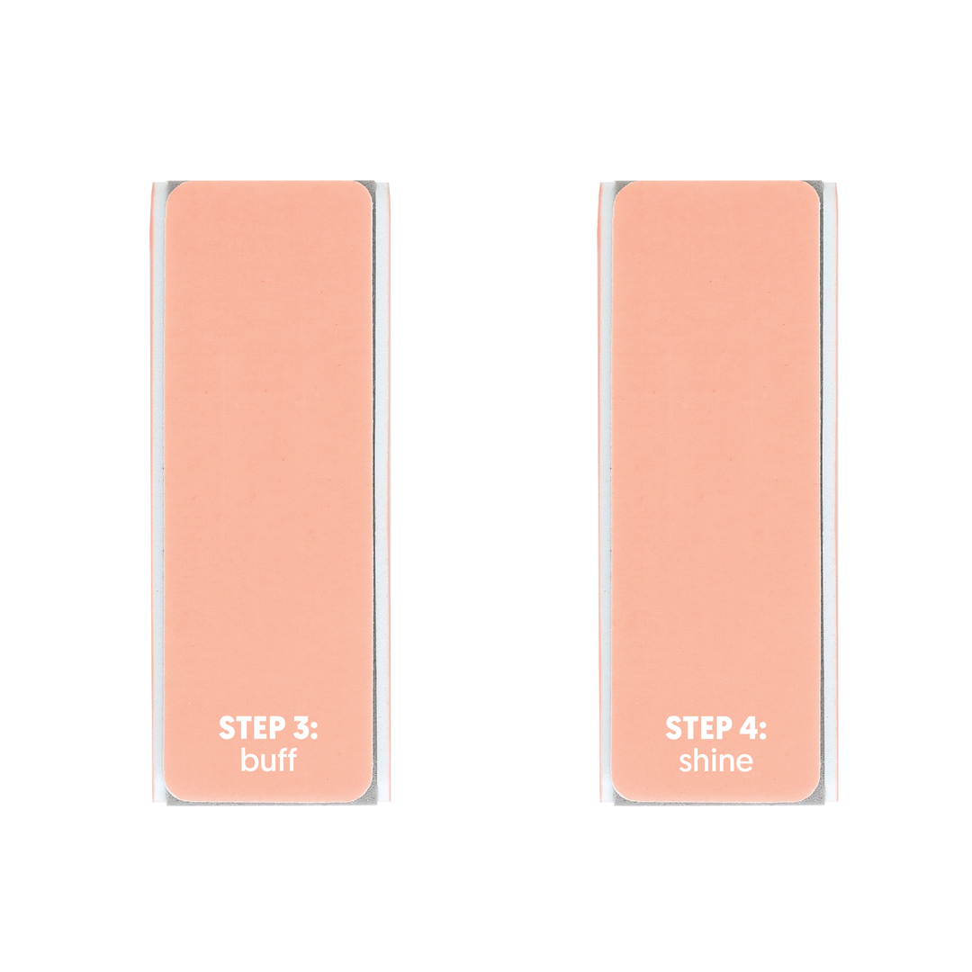 Peach nail buffer blocks showing step 3 buff and step 4 shine sides