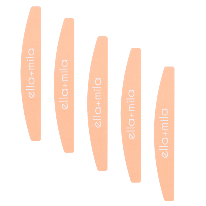 Five peach half-moon nail files fanned out