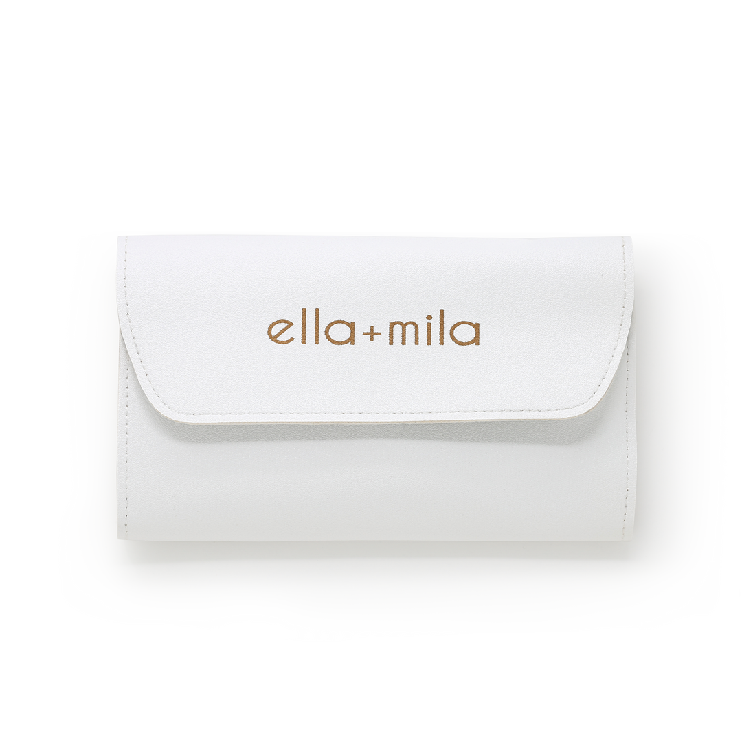 ella+mila manicure Tool Kit in its white roll-up case, closed