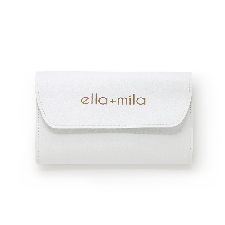 ella+mila manicure Tool Kit in its white roll-up case, closed