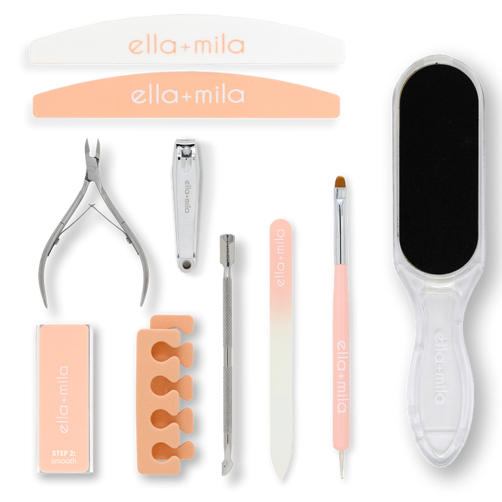 Manicure Tool Kit contents laid out: files, buffer, nipper, clipper, pusher, dotter, foot file and toe separator