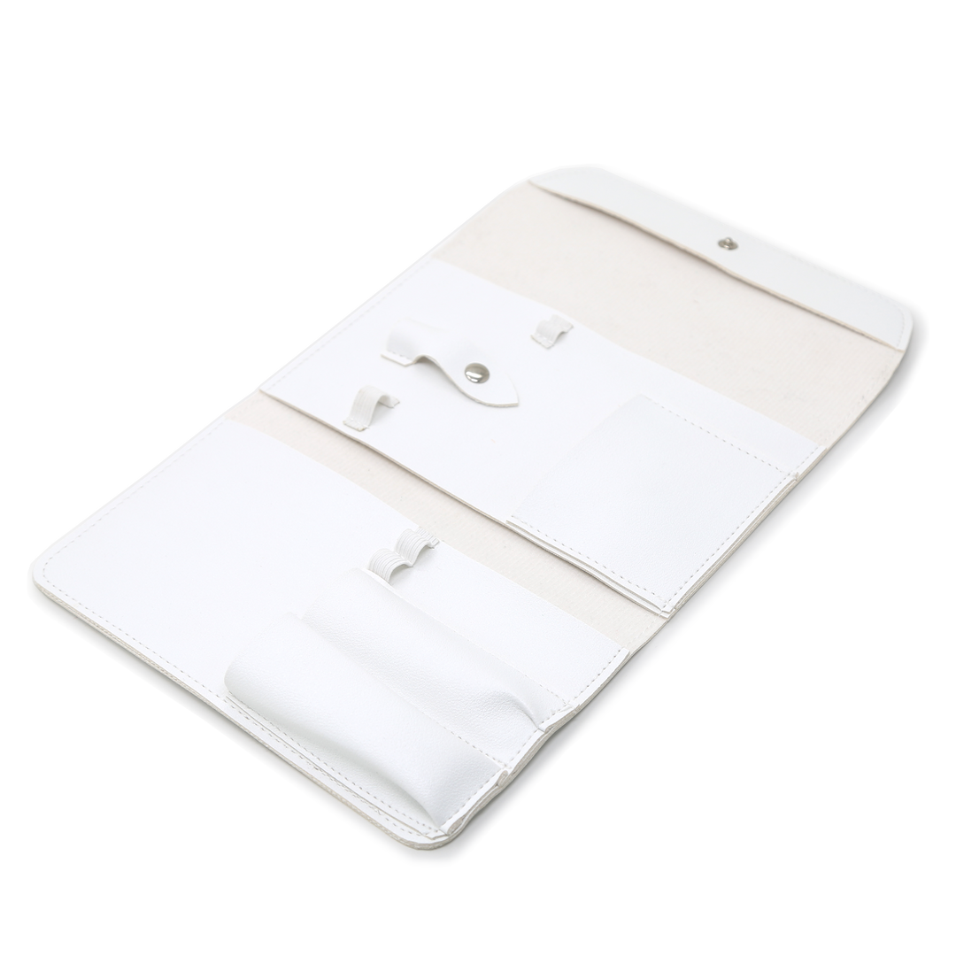 White manicure tool case unrolled with pockets, tools not included