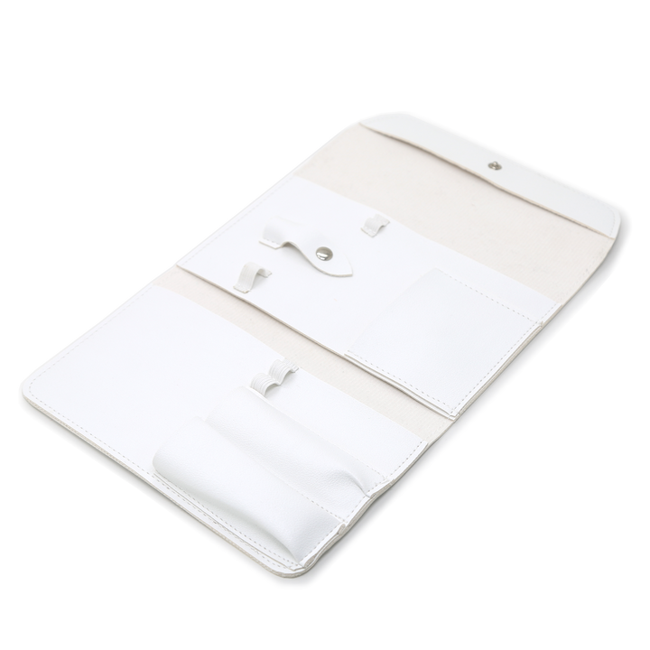 White manicure tool case unrolled with pockets, tools not included