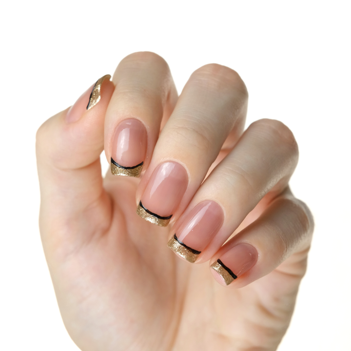 Strong sheer mauve tint nail polish with thin black French tip nail art