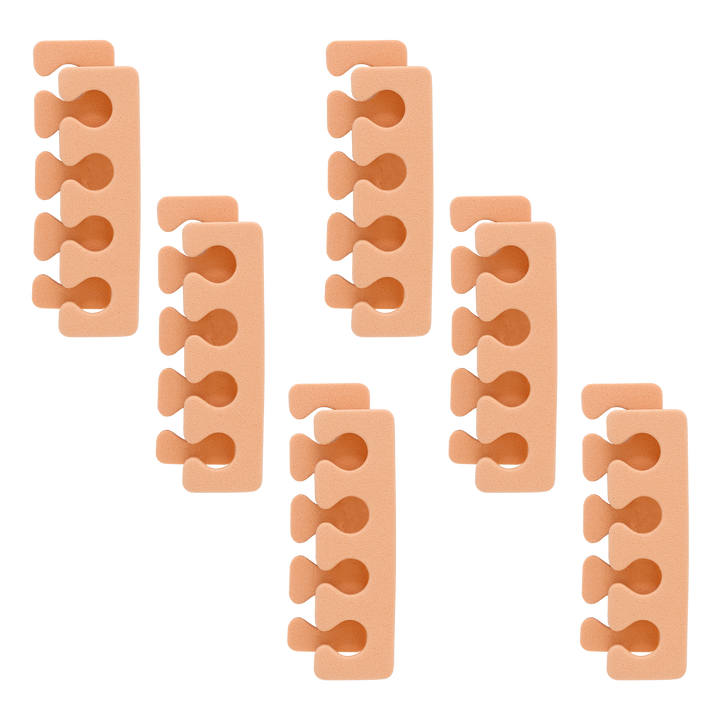 Six peach foam toe separators arranged on a white background