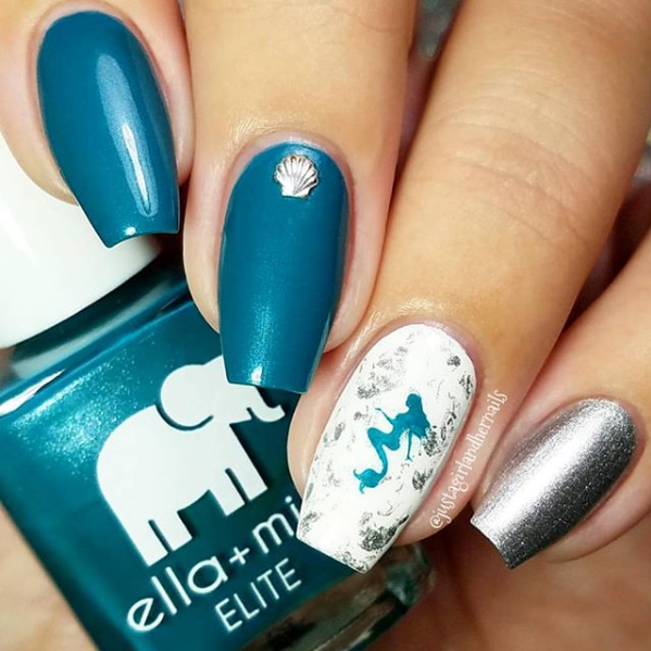 Under the Sea teal nail polish with white marble and silver accent nail art