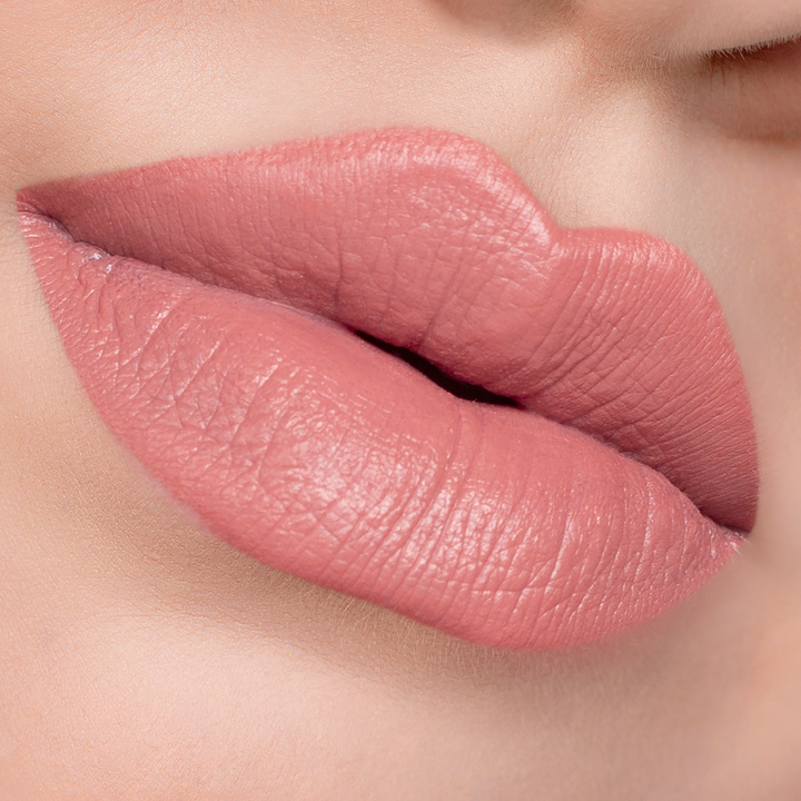 Your Muse rosy pink lipstick on lips, light skin tone close-up