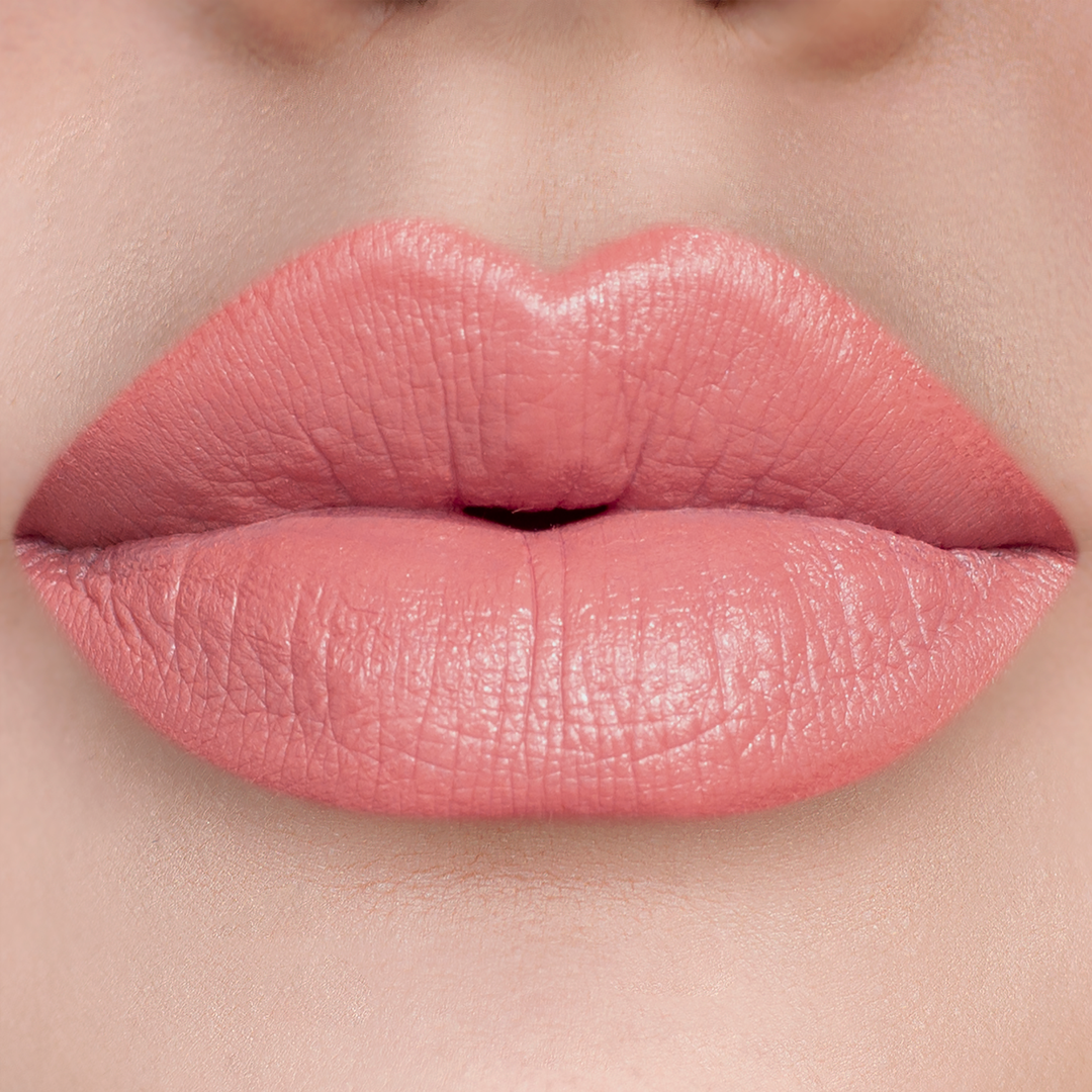 Your Muse rosy pink lipstick on lips, light skin tone