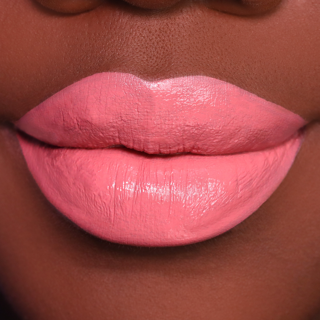 Your Muse rosy pink lipstick on lips, medium-deep skin tone